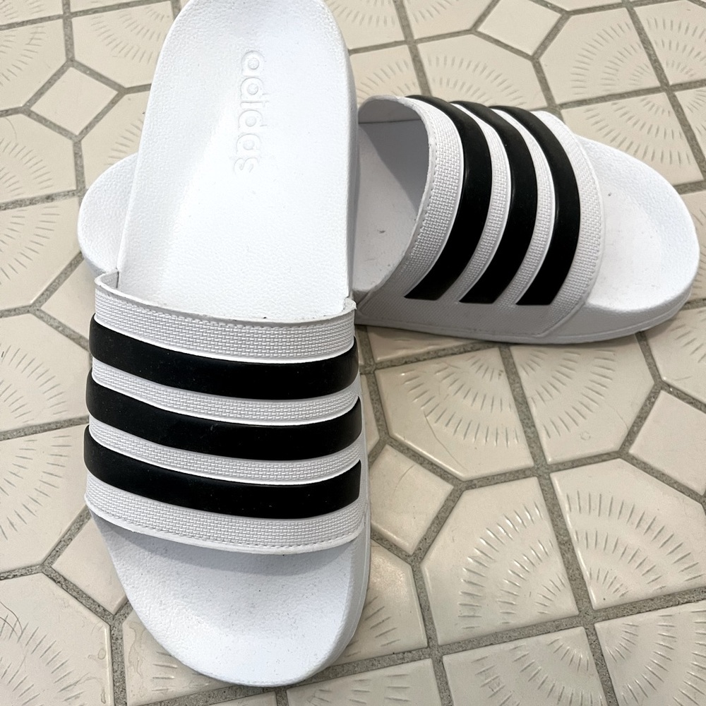 Never worn! For the beach, shower shoes for the gym, or walking around the house